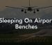Sleeping On Airport Benches